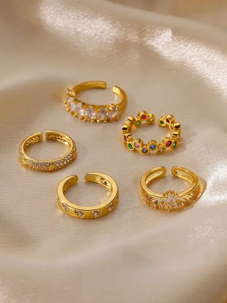 Elegant geometric heart ring with sparkling zircon accents and a luxurious gold-color finish. Made from durable stainless steel, perfect for weddings, everyday wear, or a stylish couple gift.