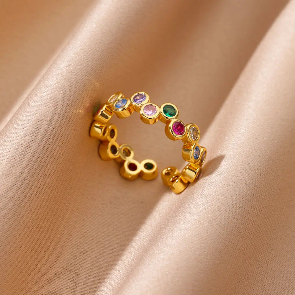 Elegant geometric heart ring with sparkling zircon accents and a luxurious gold-color finish. Made from durable stainless steel, perfect for weddings, everyday wear, or a stylish couple gift.