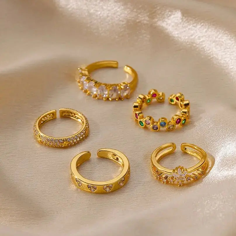 Elegant geometric heart ring with sparkling zircon accents and a luxurious gold-color finish. Made from durable stainless steel, perfect for weddings, everyday wear, or a stylish couple gift.
