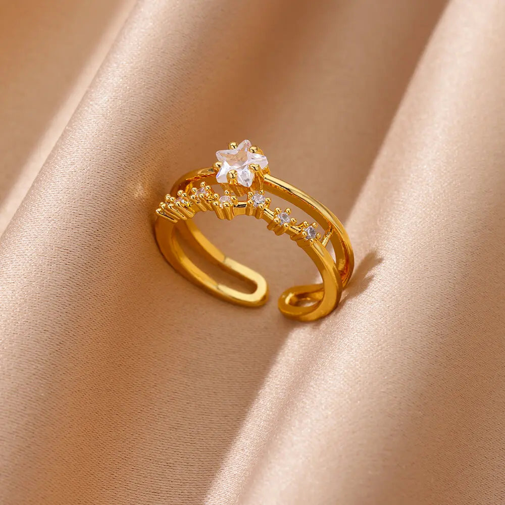Elegant geometric heart ring with sparkling zircon accents and a luxurious gold-color finish. Made from durable stainless steel, perfect for weddings, everyday wear, or a stylish couple gift.